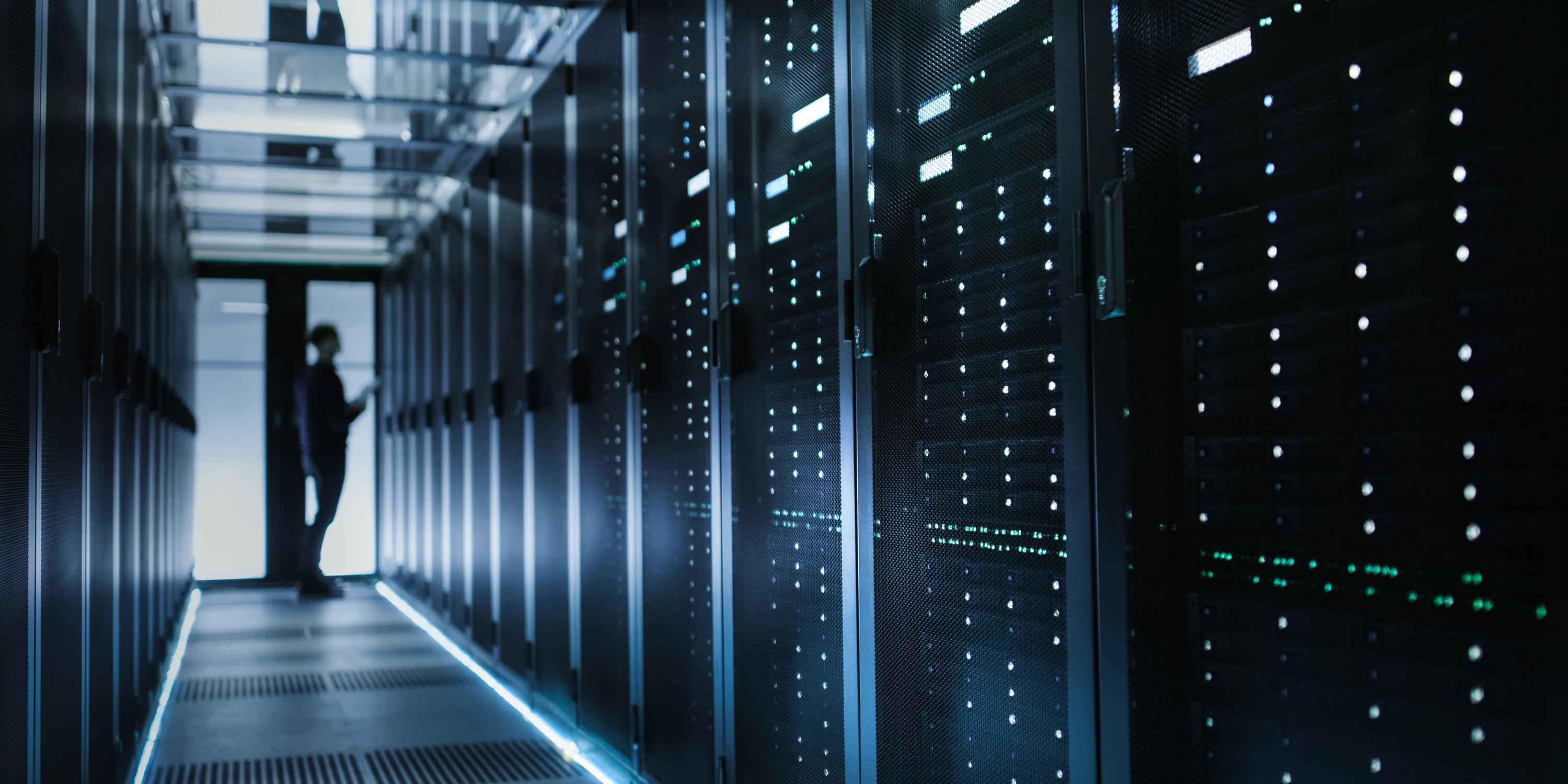 Network engineer check racks at data center