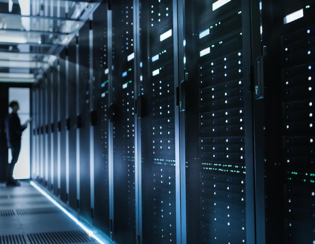 Network engineer check racks at data center